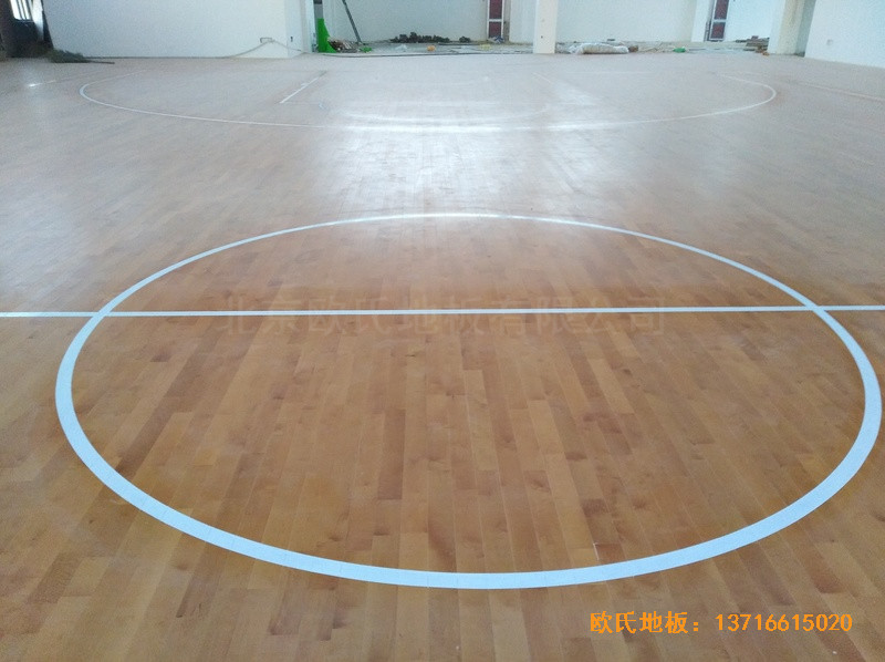 江苏徐州悦城小学篮球馆运动木地板铺设案例4