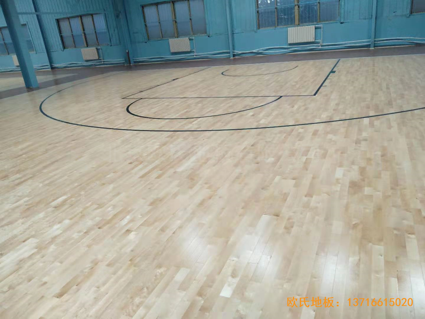 大庆让胡路区政府篮球馆运动木地板安装案例5